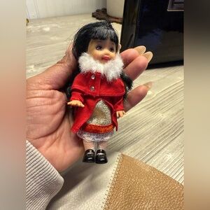 1994 original Red Doll with Black Hair and White Trim